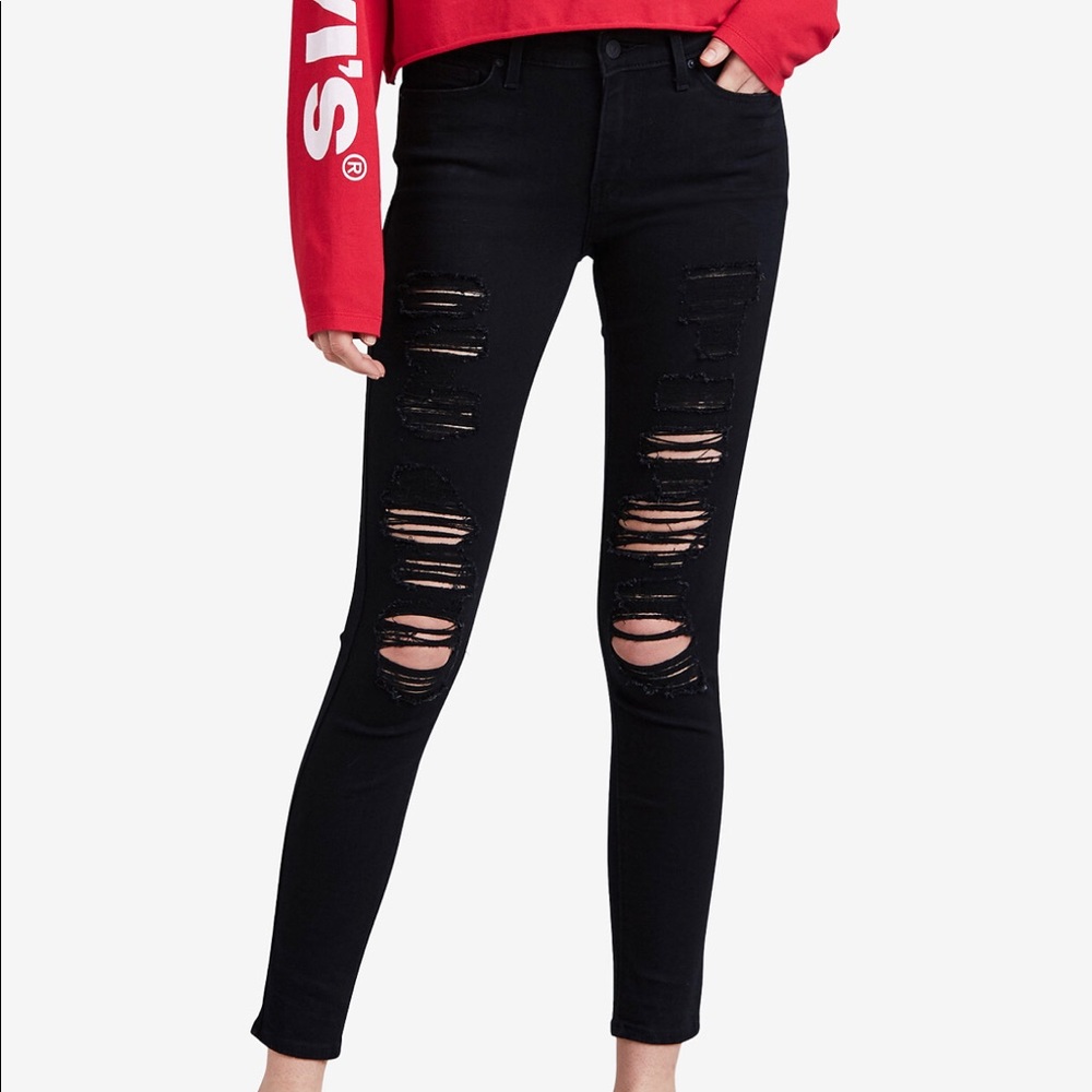 Levi’s destroyed Black 711 Skinny Jeans